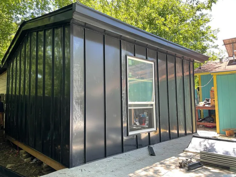 Black standing seam metal wall panels for Metal Roof Installation in Guadalupe